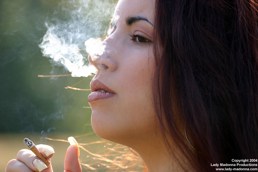 Girls smoking nose exhales